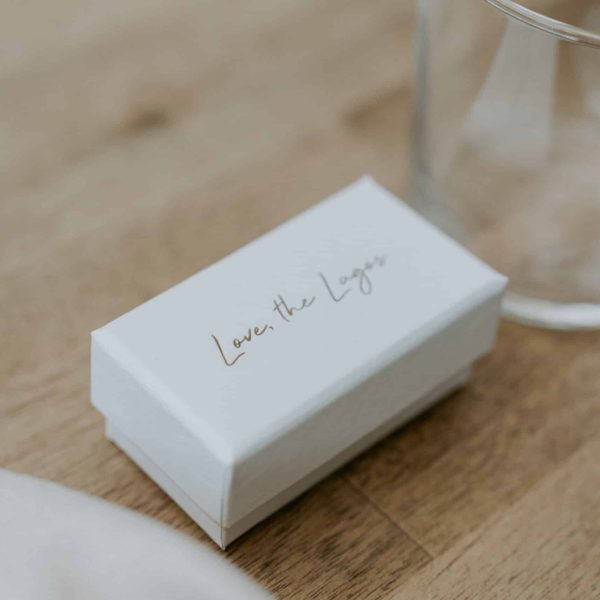 custom wedding favours with the inscription ''the lagos'' hotfoiled on the box lid